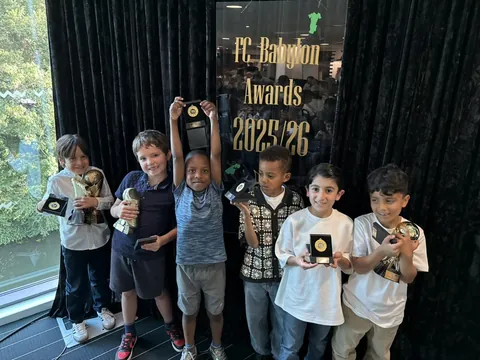 Young players with trophies at the awards dinner