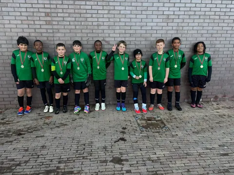 The boys with their medals after a tournament
